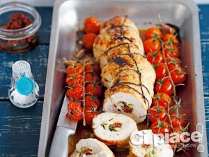 Turkey roulade stuffed with courgette, feta cheese and dried tomatoes