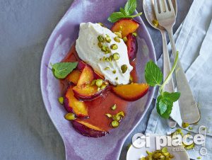 Honey-glazed plums with ginger and tofu cream and pistachio nuts