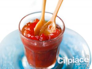 Pepper jam in a glass with spoons